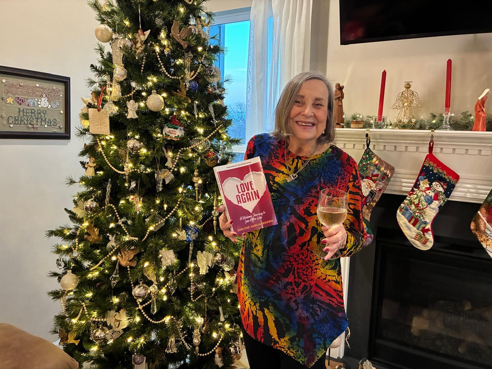 Widow holding Love Again book